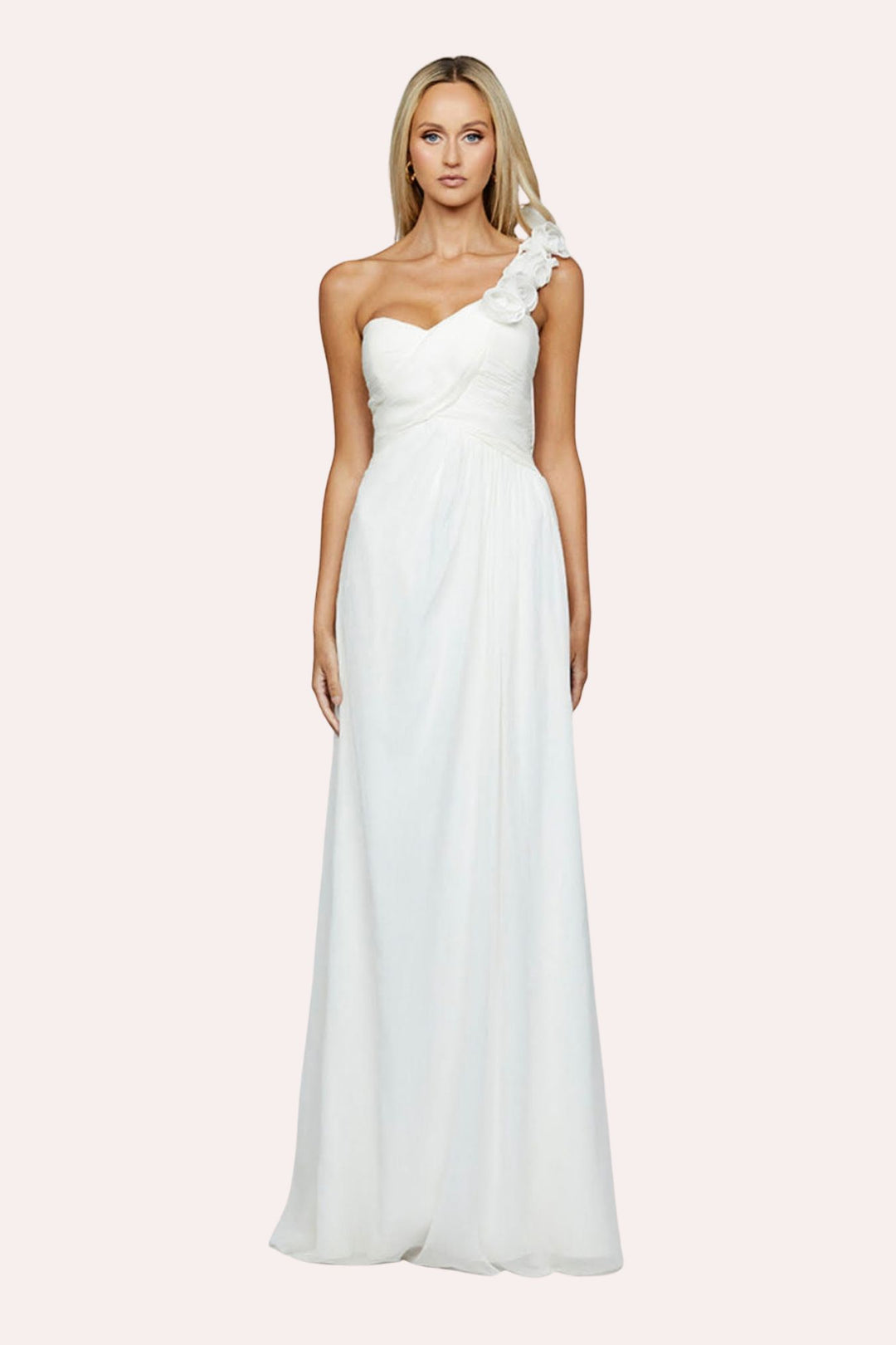 Model  showing front of a white one-shoulder dress with pink backdrop